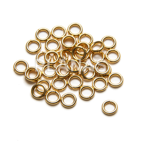 Anillas en Acero Inoxidable y Baño Oro.4x0,7mm.Bolsas de 500 unidades.