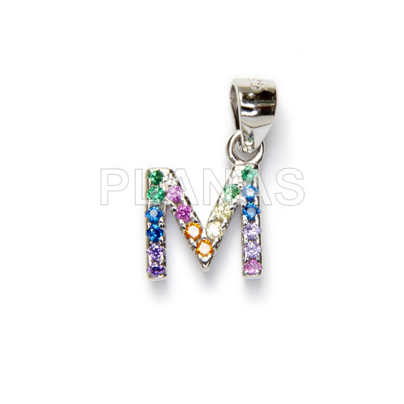 Letters in sterling silver and zirconia.