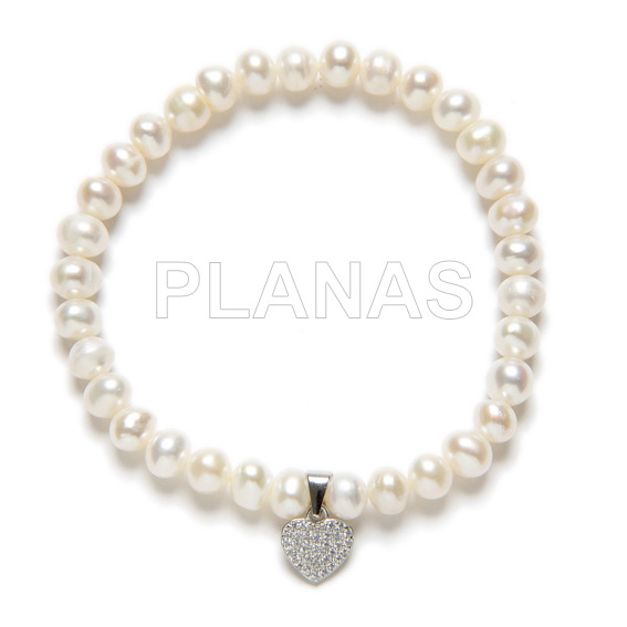 Pulsera Elastica con Perla Cultivada de 6mm y Corazón en Plata de ley y Circonitas.