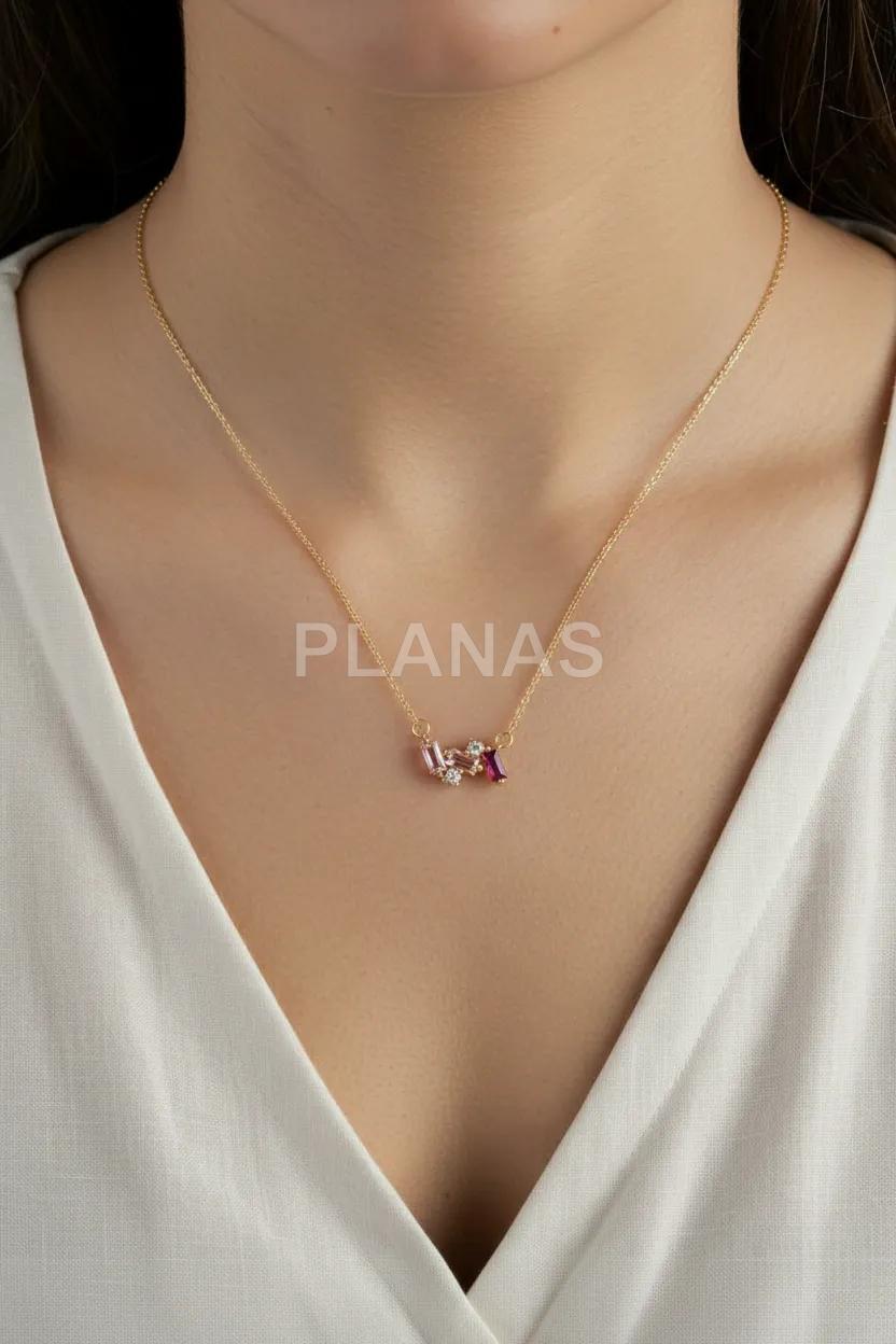 Colgante en Plata de ley y baño oro con Circonitas rosas. 