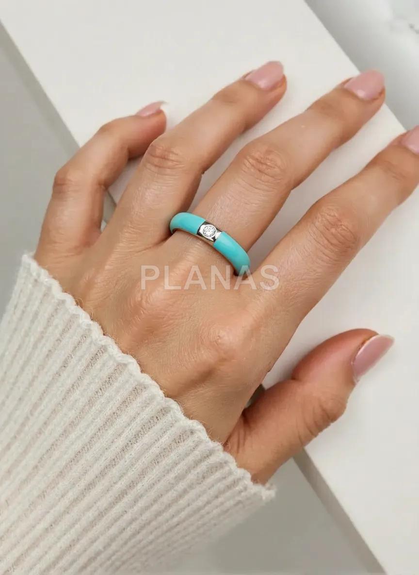 Anel em prata de lei com zircônias cúbicas e esmalte água-marinha.