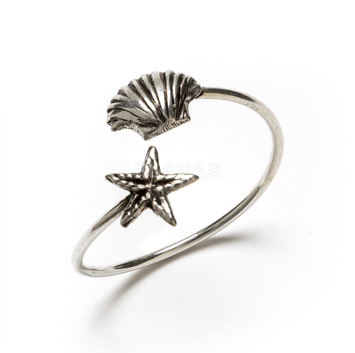 Anillo ajustable en Plata de Ley.CONCHA Y ESTRELLA DE MAR