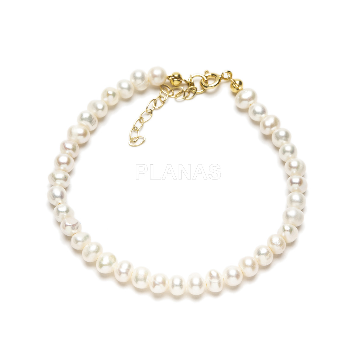 Set of necklace, bracelet and earrings in sterling silver and gold plated with cultured pearl.