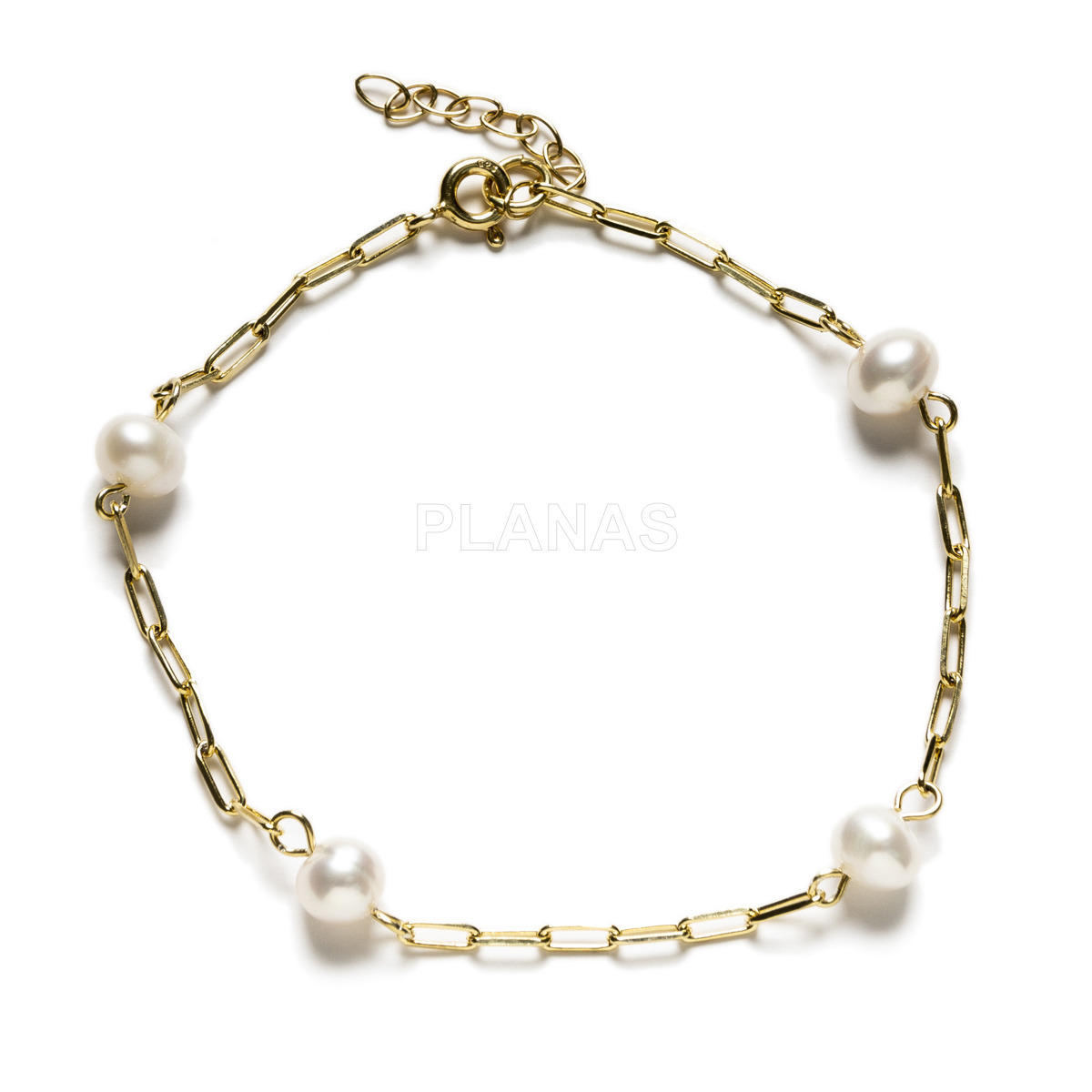 Set of necklace, bracelet and earrings in gold plated sterling silver with cultured pearl.