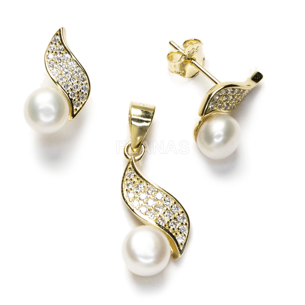 Rhodium-plated sterling silver and zirconia set with cultured pearl.