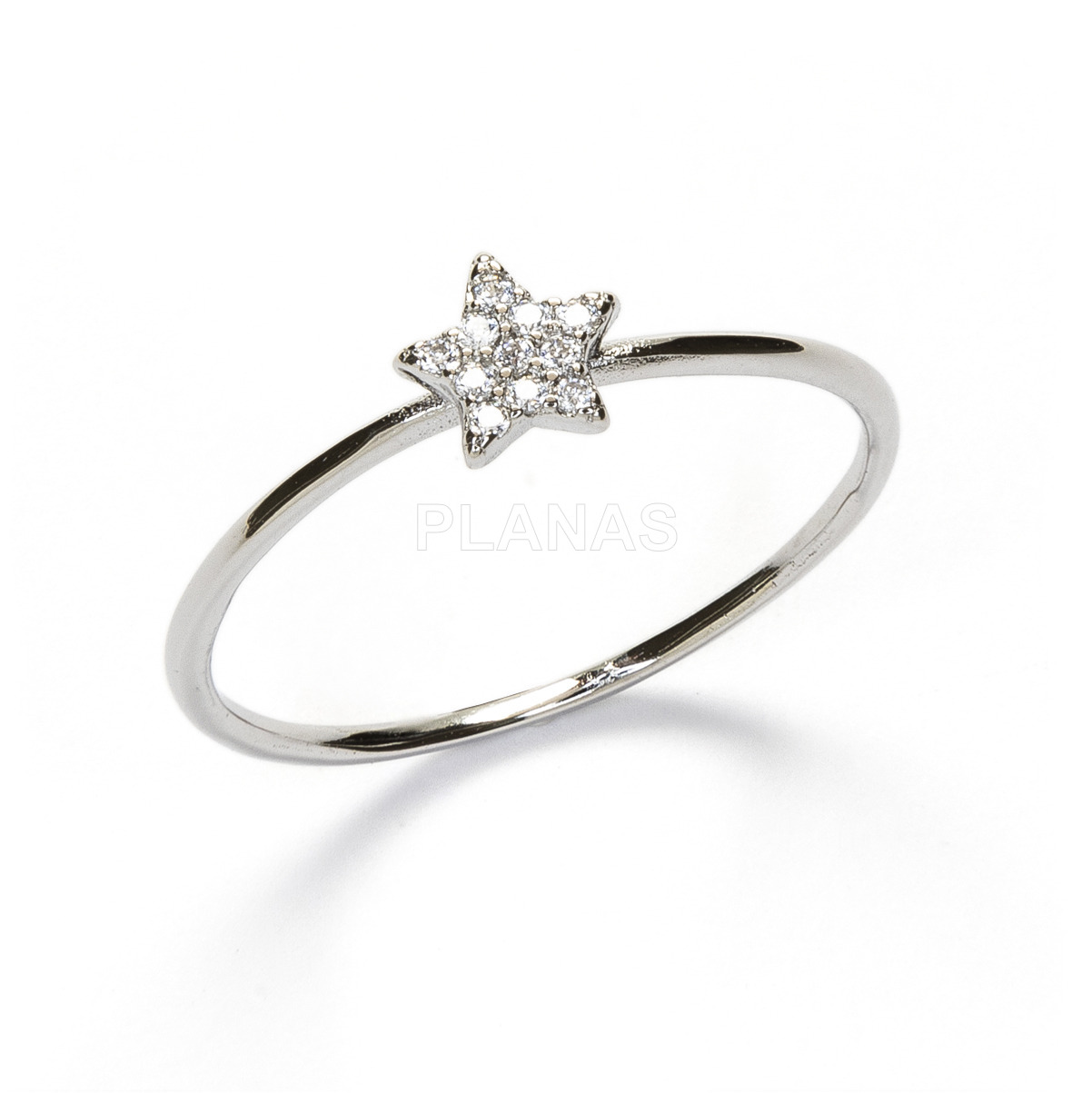 Ring in rhodium plated sterling silver and white zircons. star.