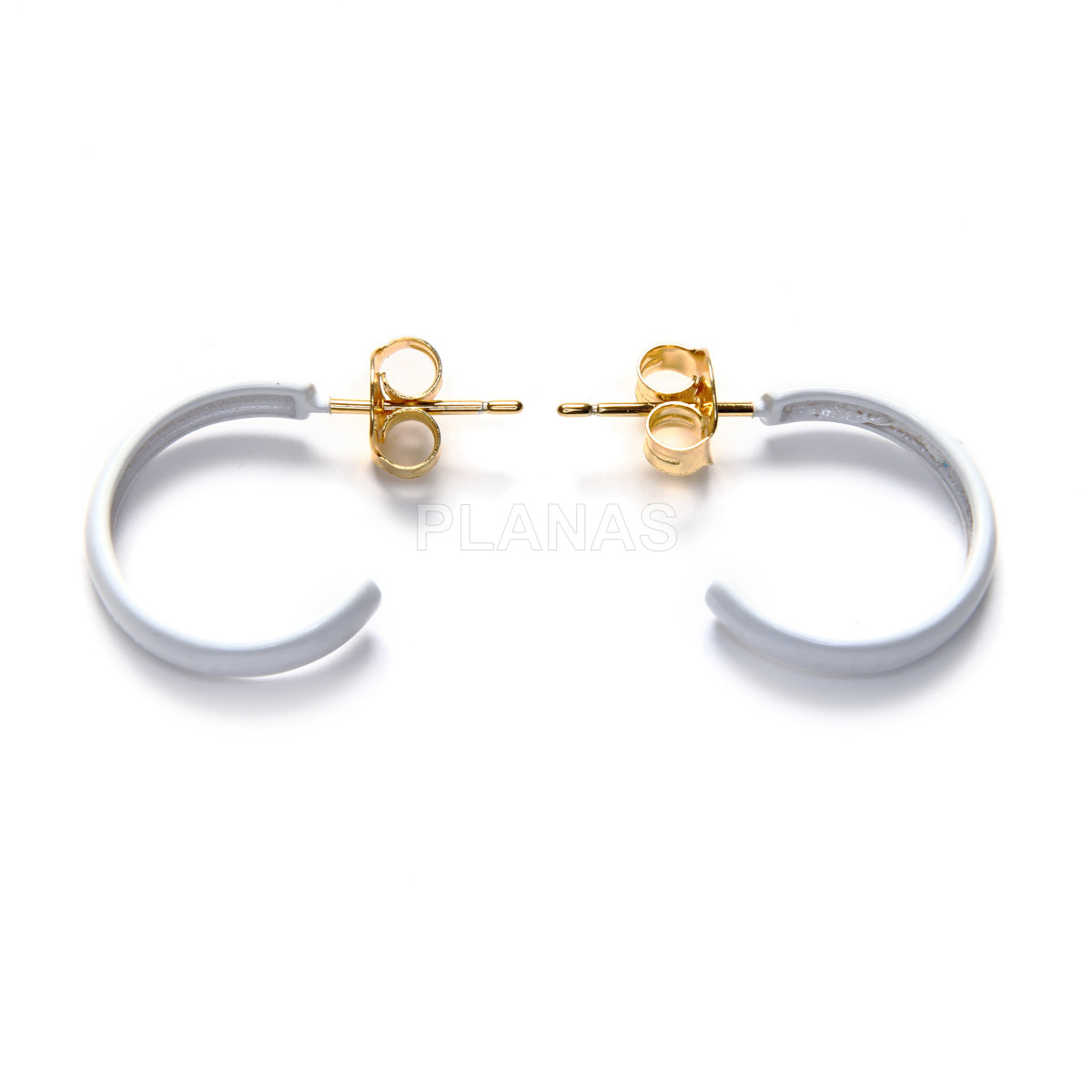 Hoops in sterling silver and gold bath with enamel.