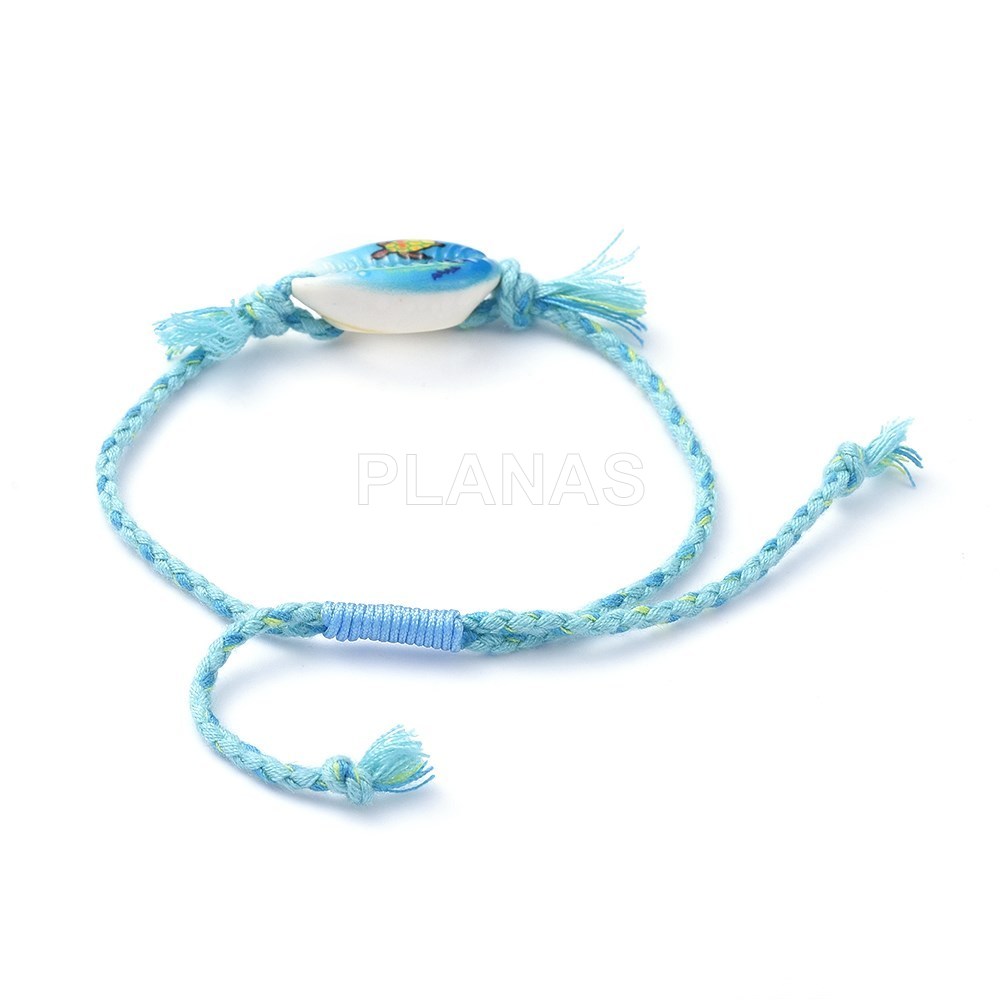 Pulsera con nudo corredero y Concha.