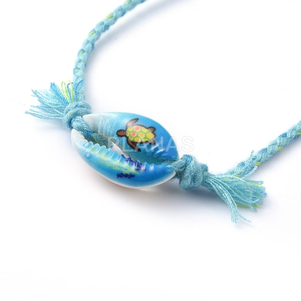 Pulsera con nudo corredero y Concha.