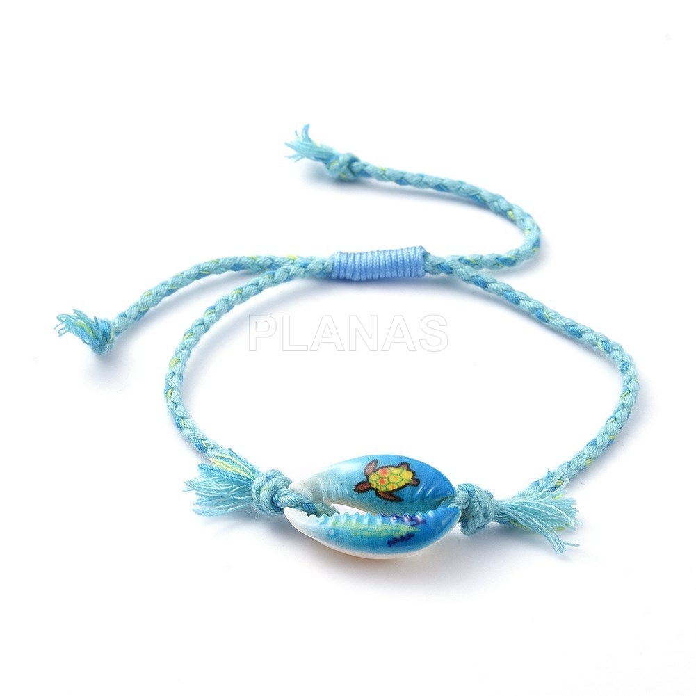 Pulsera con nudo corredero y Concha.