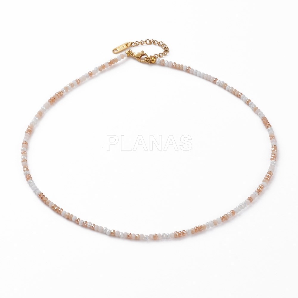 Colar em aço inoxidável e banhado a ouro.