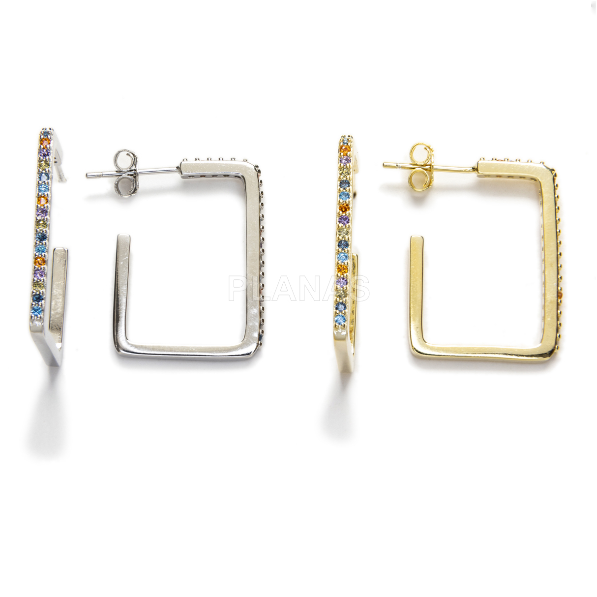 Hoops in rhodium-plated sterling silver and colored zircons.