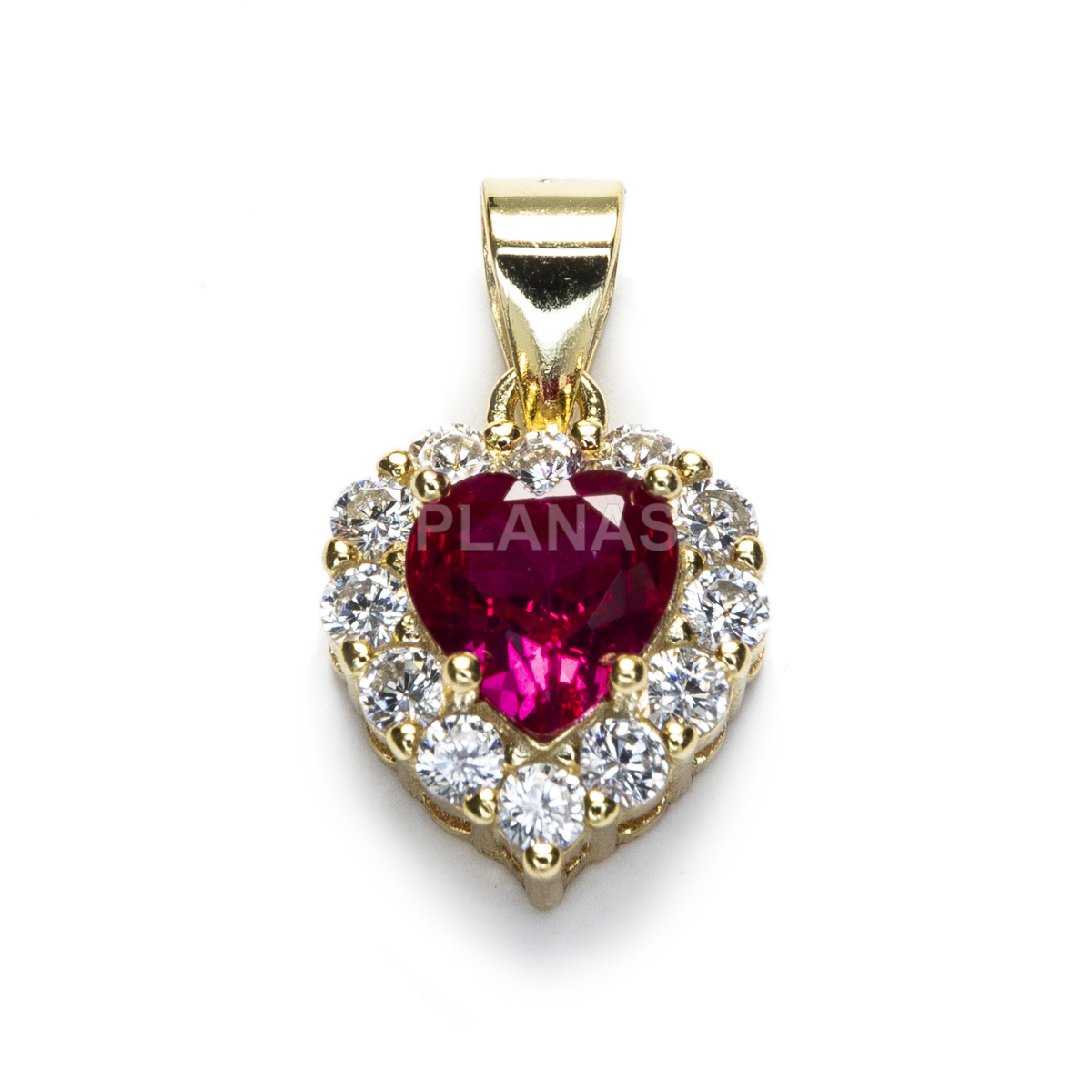 Pendant in sterling silver and gold plated with zircons. heart.