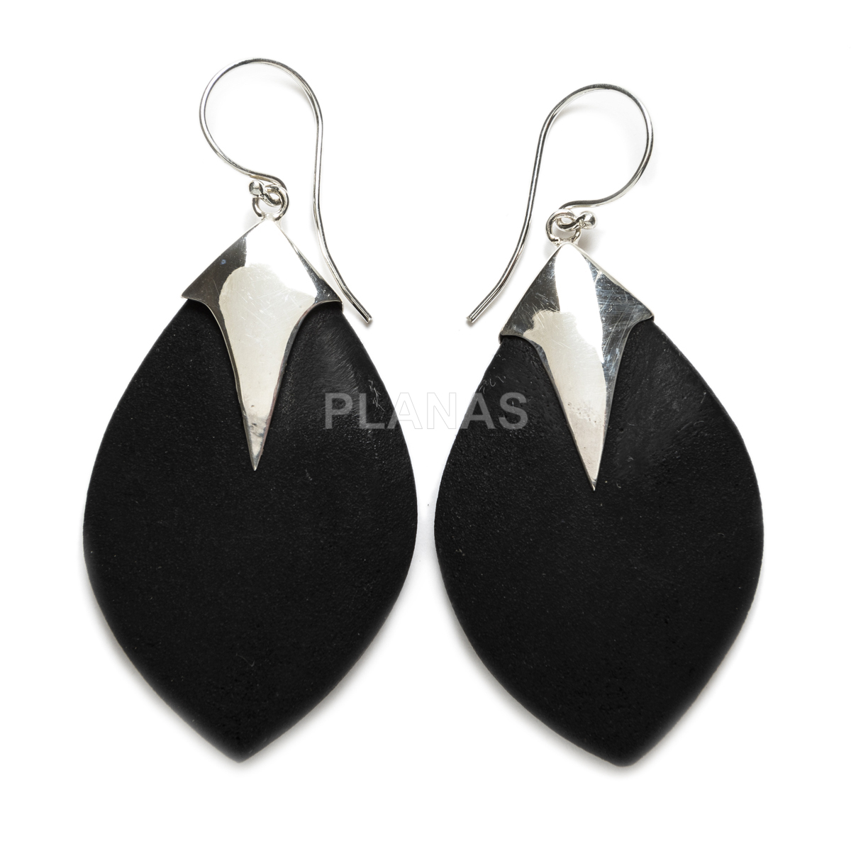 Earrings in sterling silver and volcanic lava.