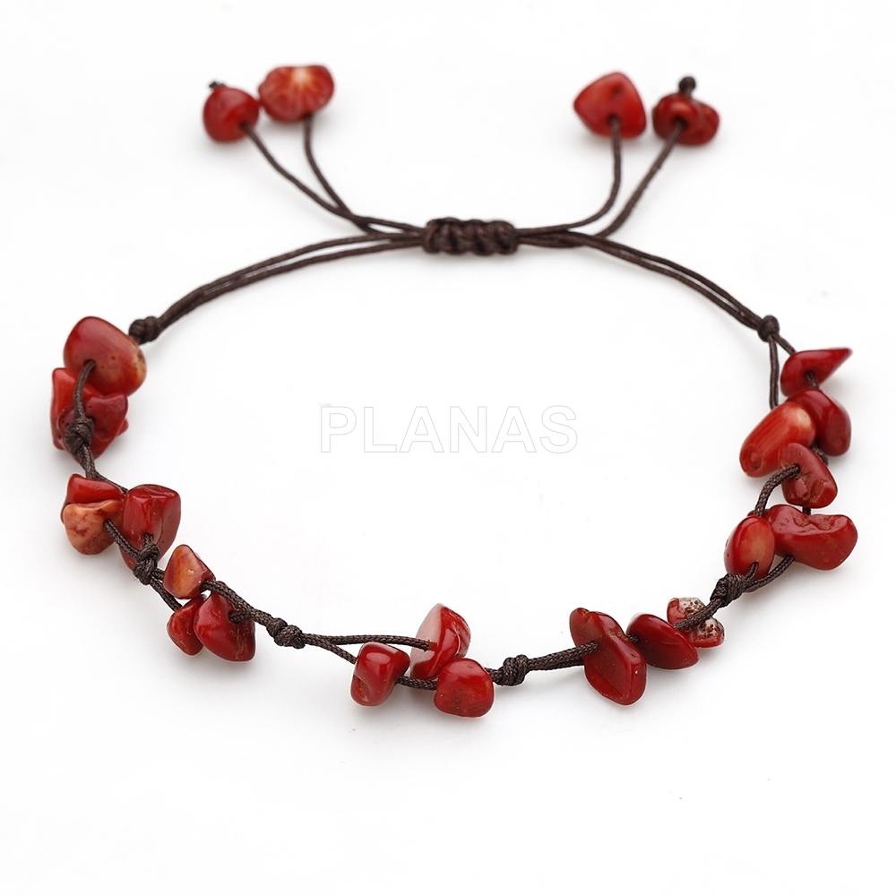 Pulsera con nudo corredero y Coral. 