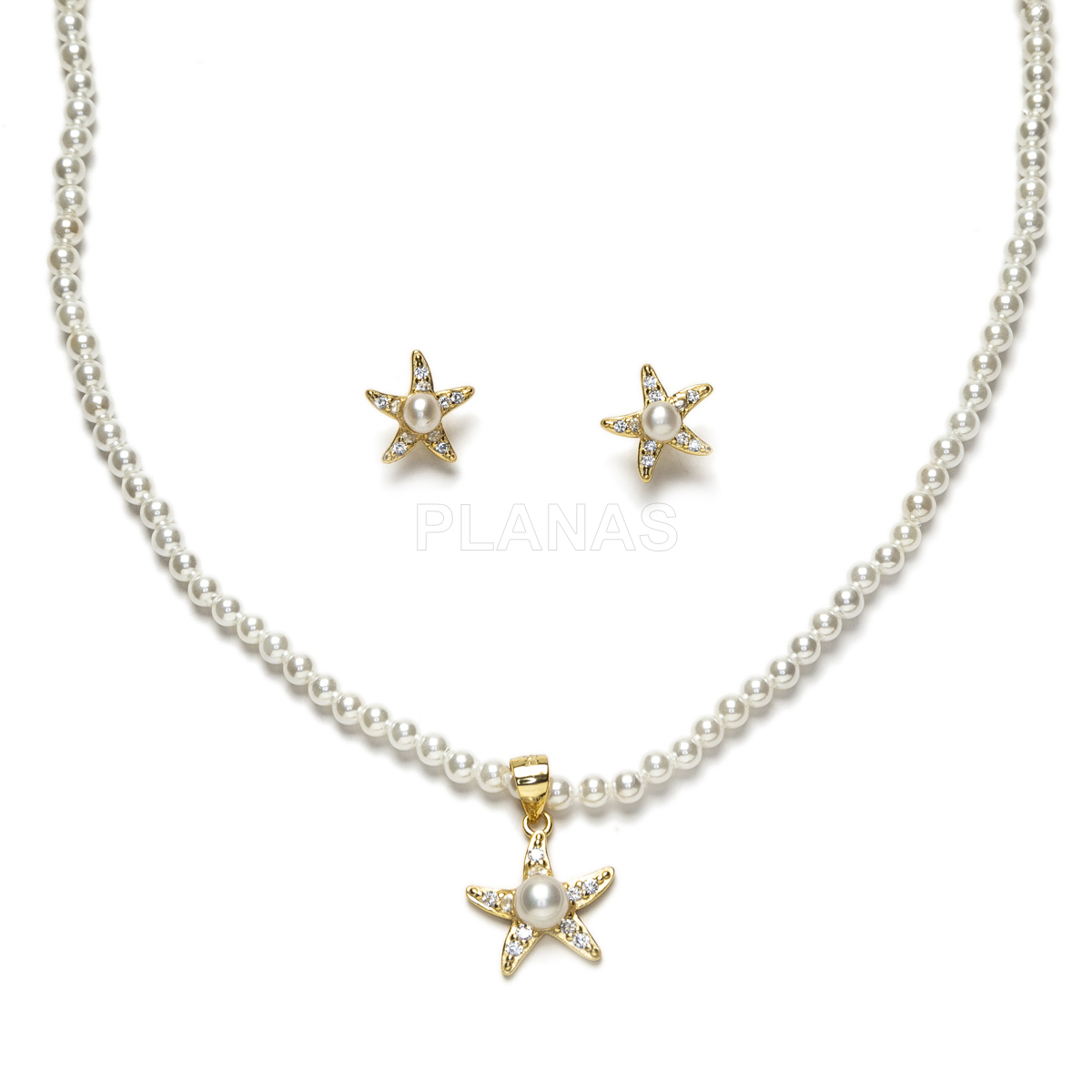 Conjunto em prata de lei e banhado a ouro com zircões e pérolas shell de 3 mm. estrela do mar.