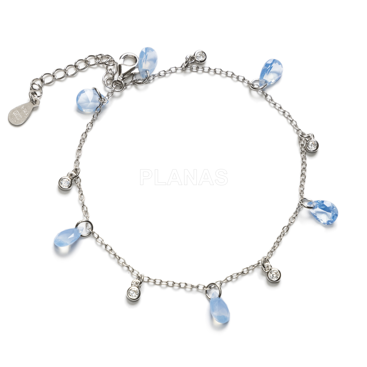 Pulsera en Plata de Ley Rodiada y Circonitas azules. 