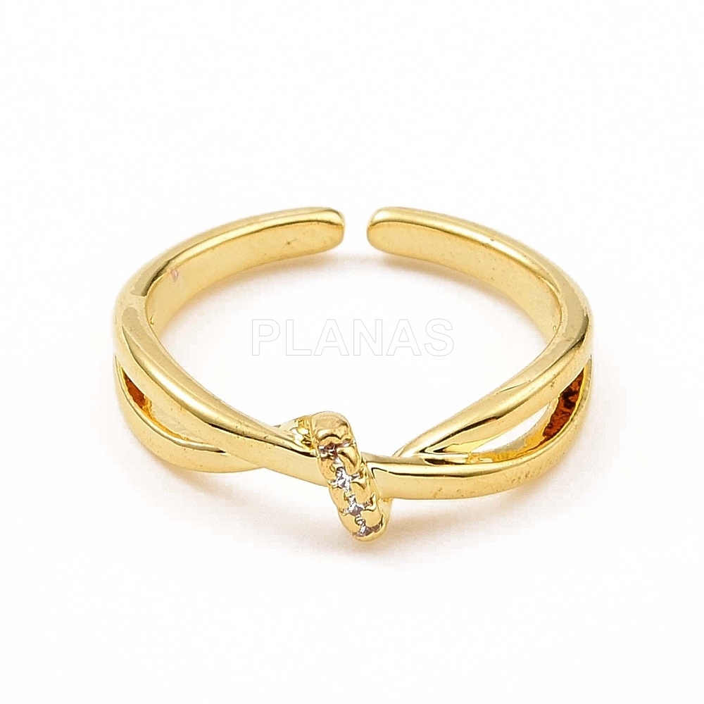 Anel banhado a ouro e latão com zircônia. 