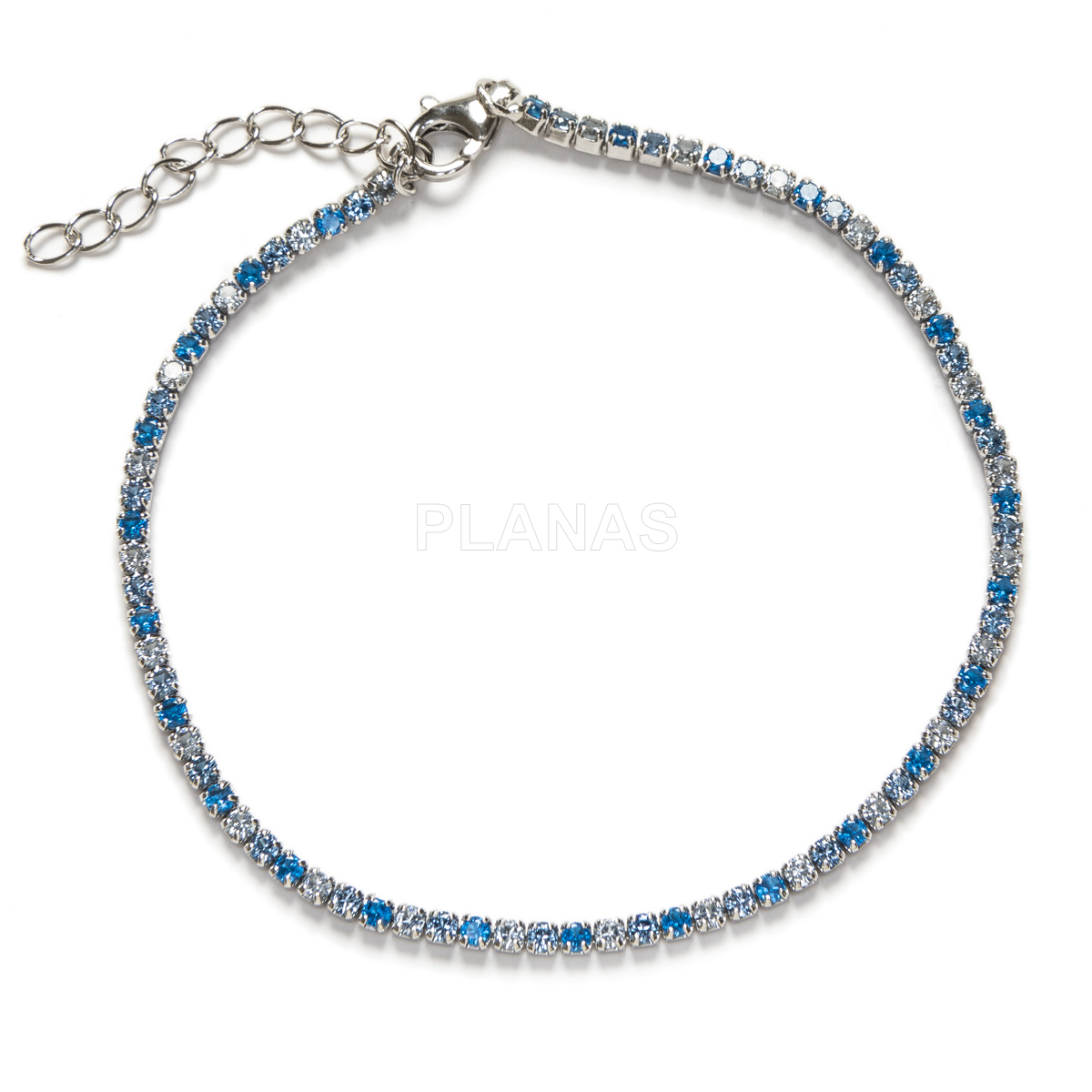 Pulseira em prata de lei e zircônias banhadas a ródio. riviere.