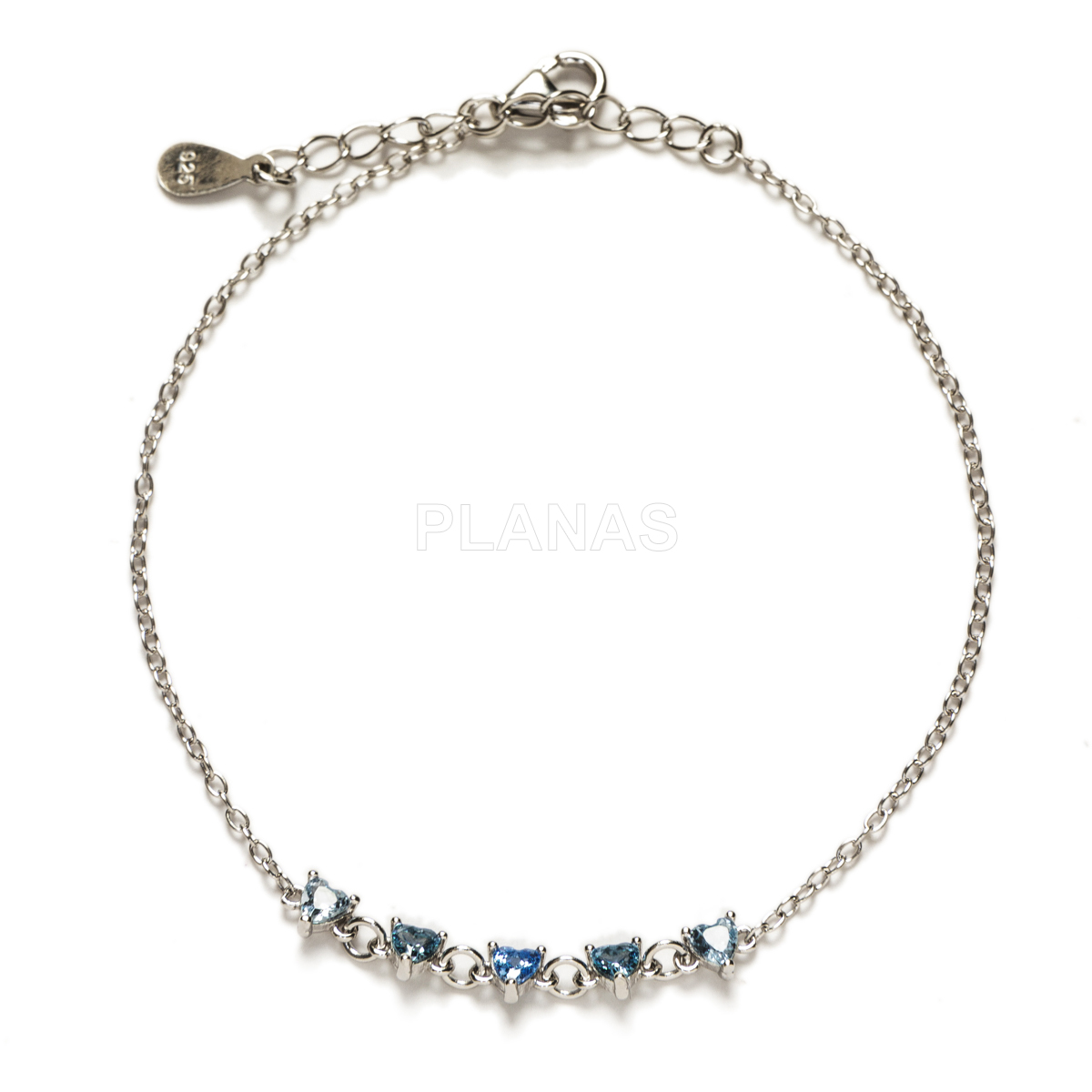 Pulseira em prata de lei banhada a ródio e zircônias azuis. corações.