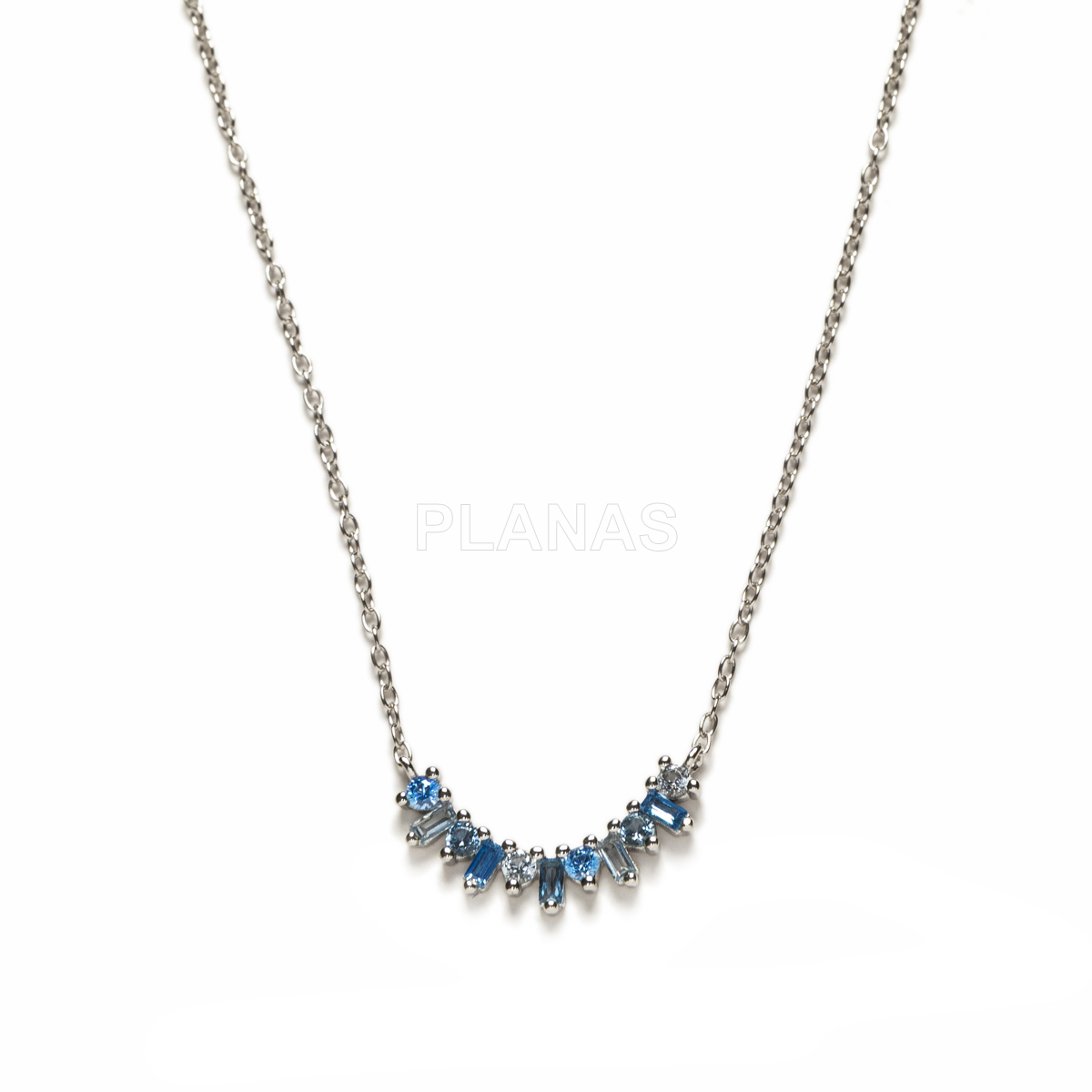 Colgante en Plata de ley rodiada y Circonitas azules.