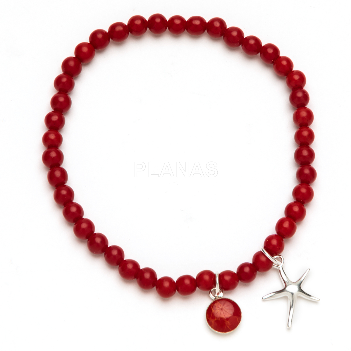 Pulseira elástica em prata de lei e coral. 