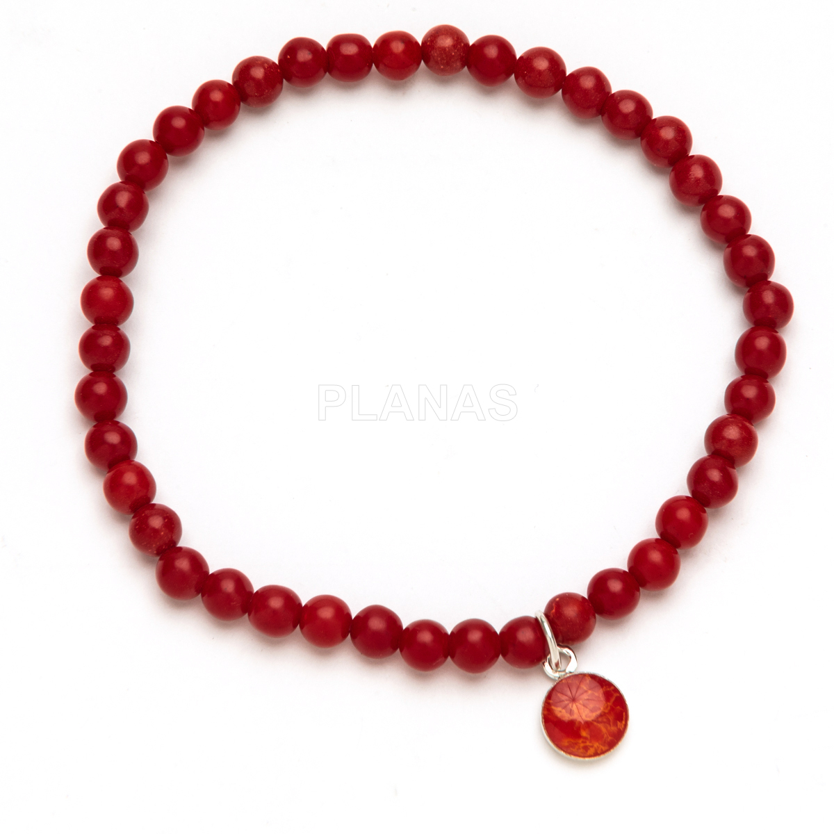 Pulseira elástica em prata de lei e coral.  