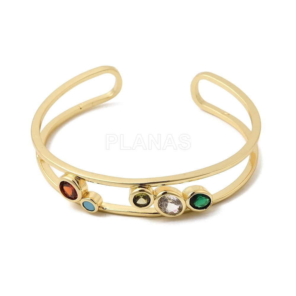 Pulsera rígida en Latón y Baño Oro con circonitas. 