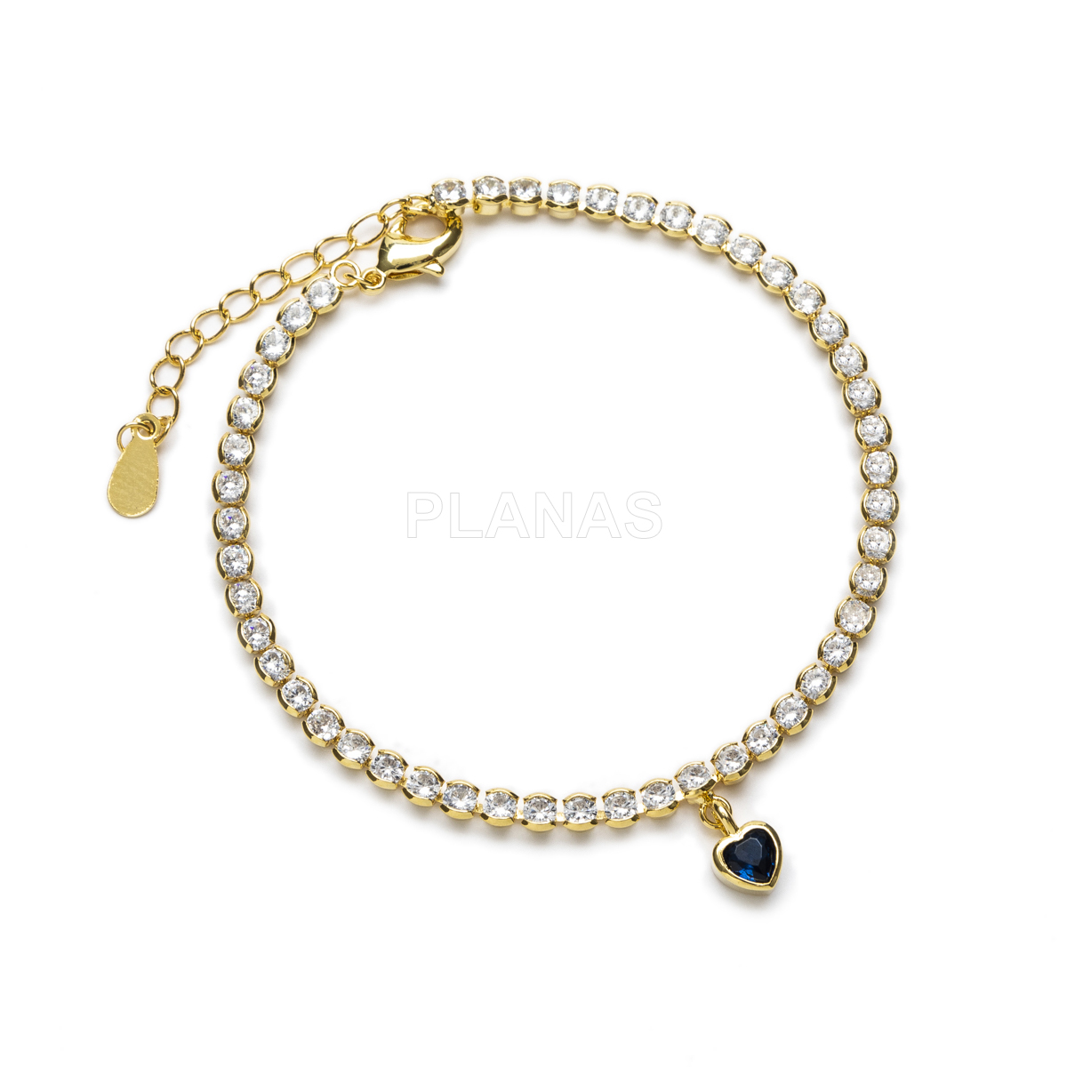 Pulsera en latón con circonitas blancas y Saphire. CORAZON.