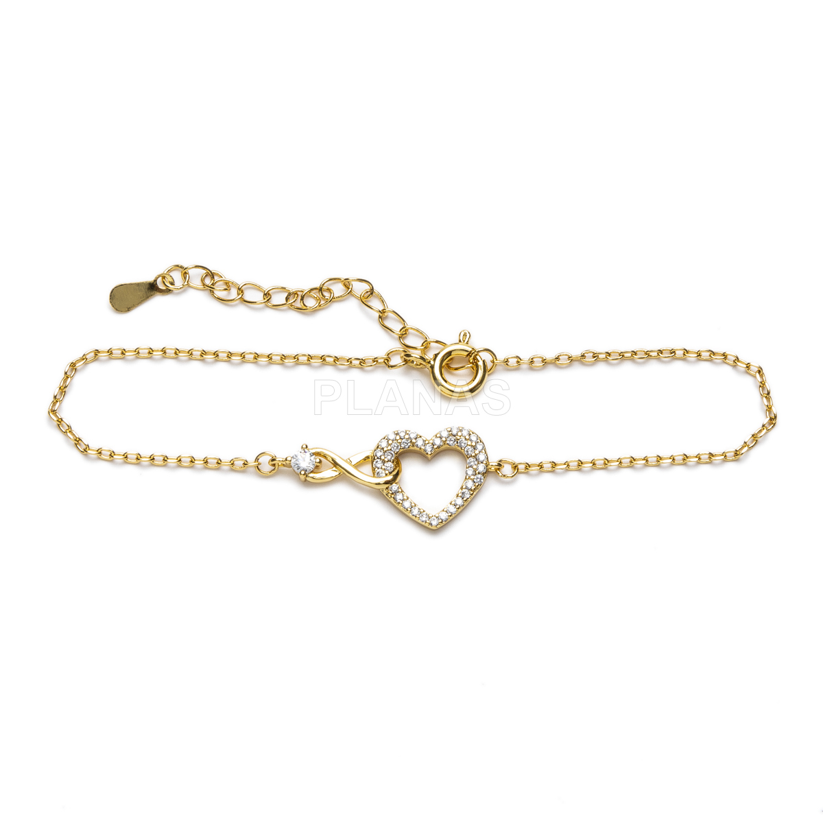 Pulsera en latón con circonitas blancas. CORAZON E INFINITO.