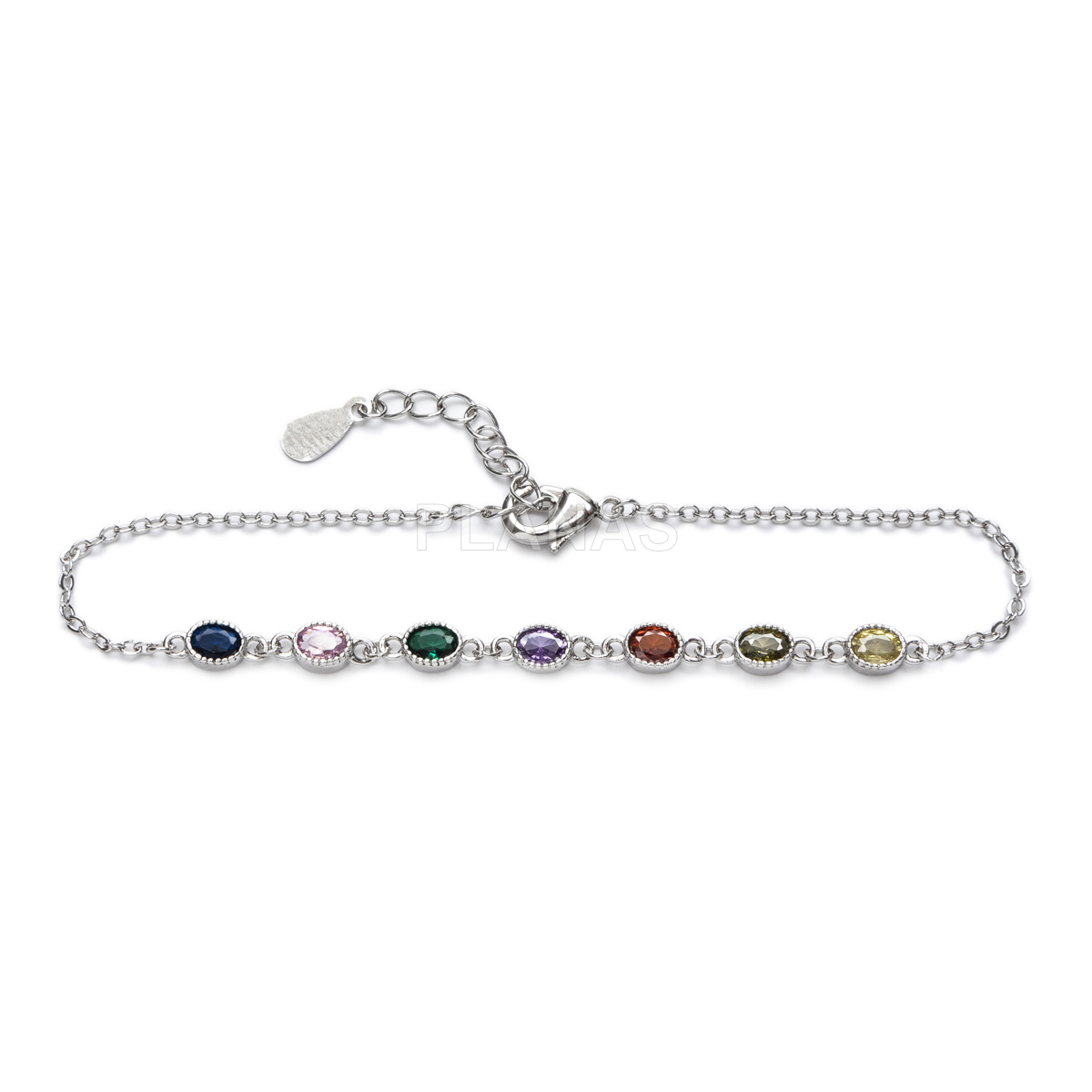 Pulsera en latón con circonitas de colores.  