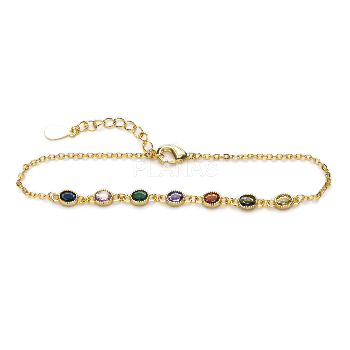 Pulsera en latón con circonitas de colores.  