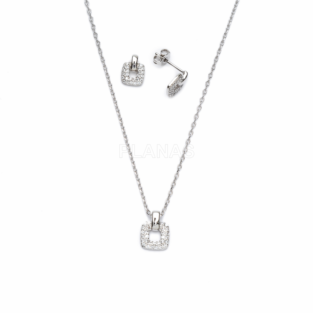 Conjunto de colar e brincos em latão e zircônias cúbicas.