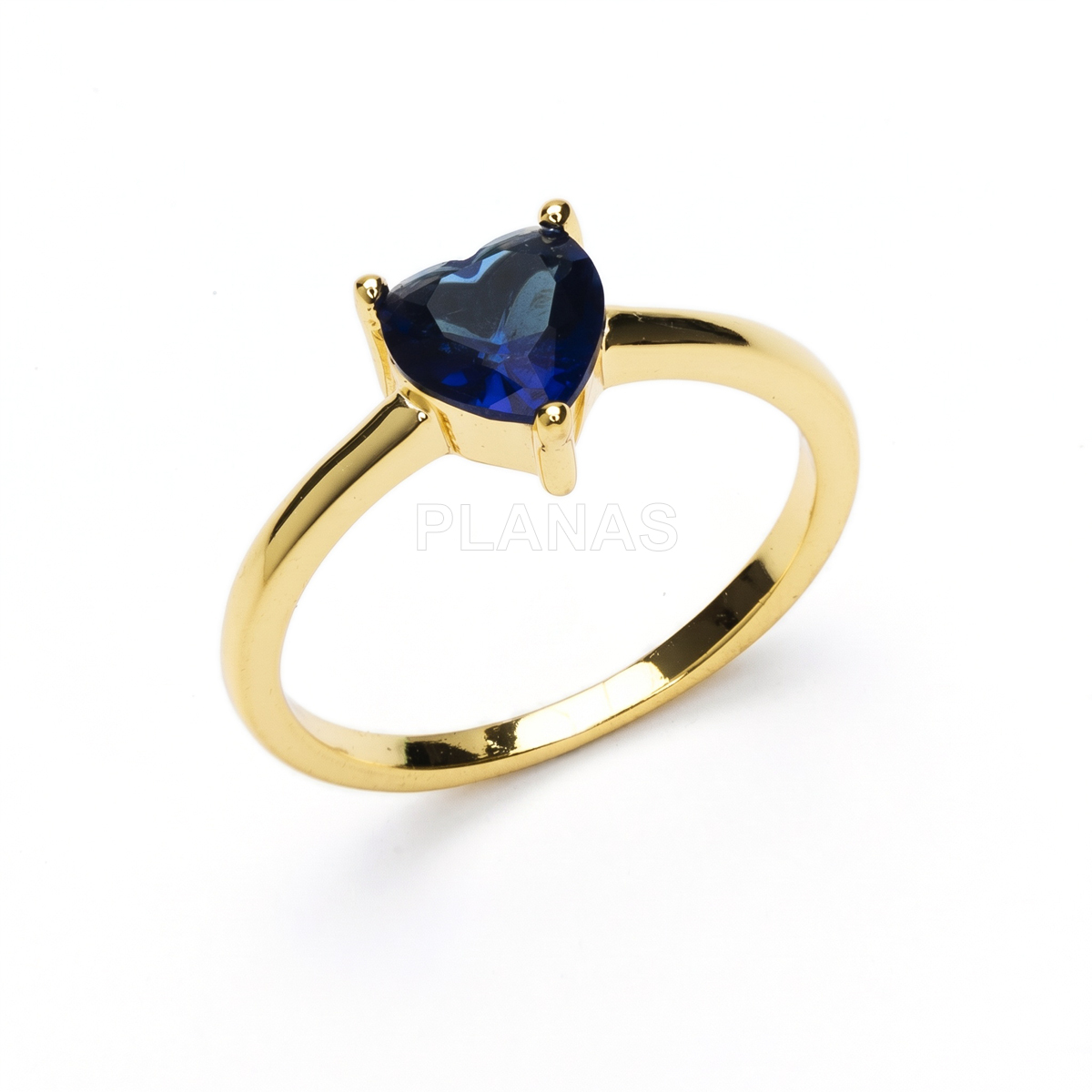 Anillo en Latón de alta calidad y Baño Oro con circonita Saphire. CORAZÓN.