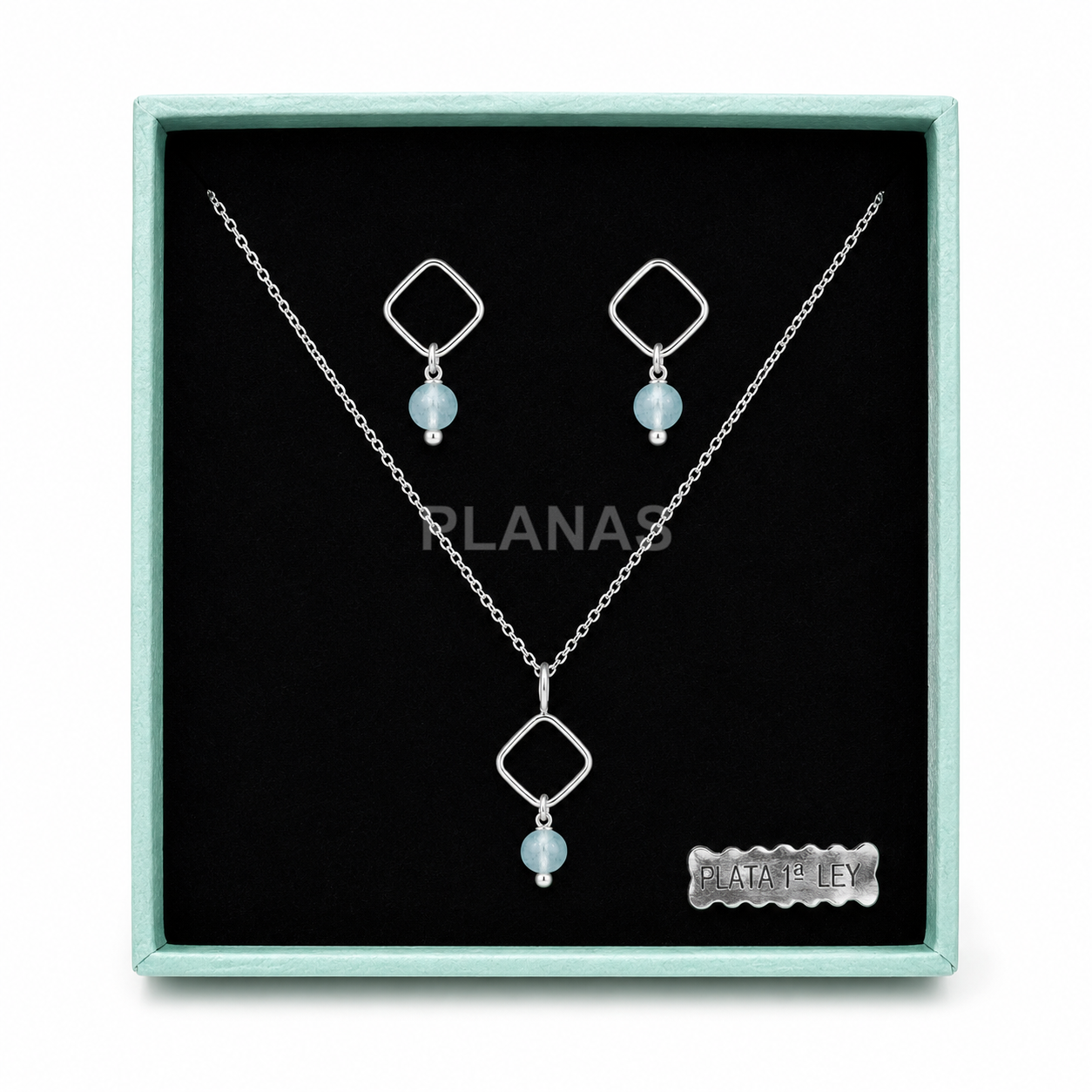 Conjunto em prata de lei com uma pedra de água-marinha de 4mm.