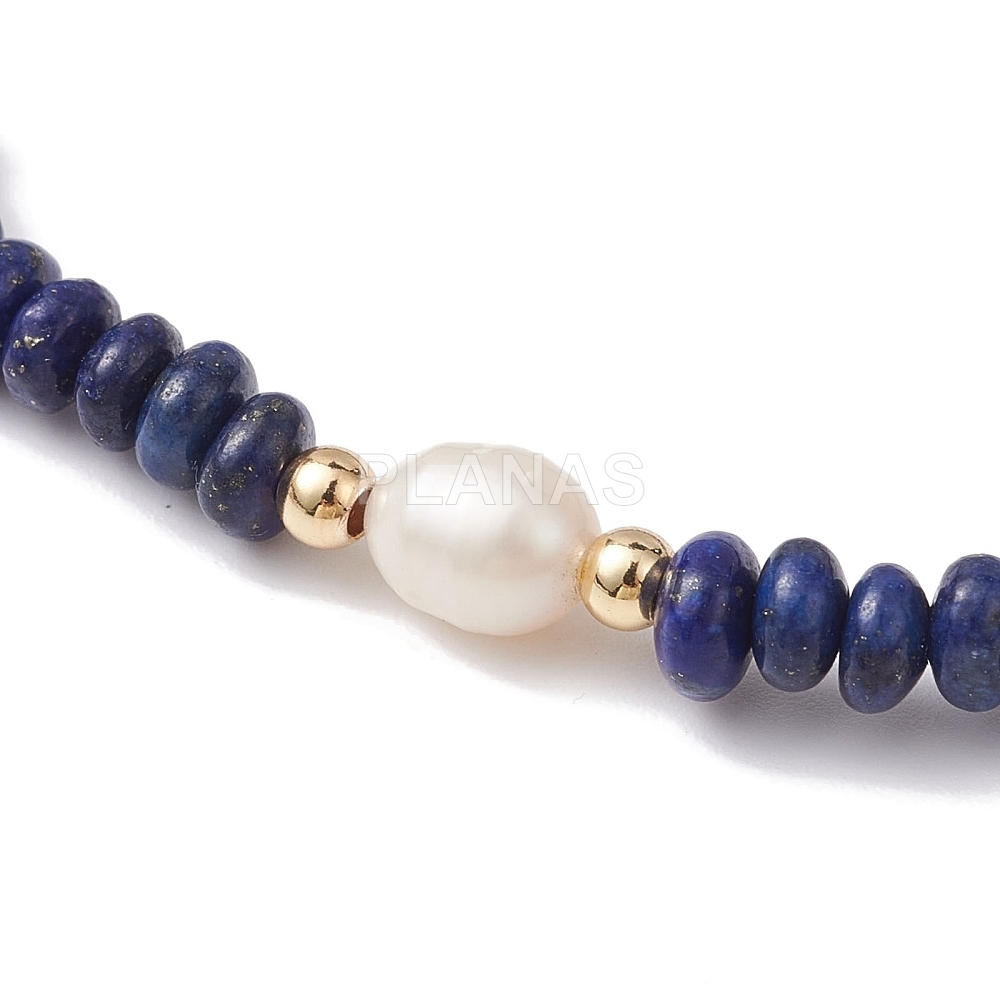 Pulsera elástica con Lapizlazuli Y perla cultivada.