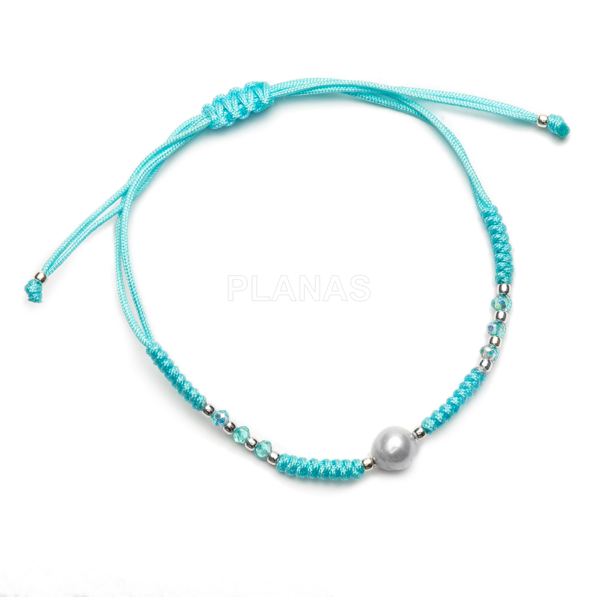 Pulseira de macramê em prata de lei e pérola cultivada. 