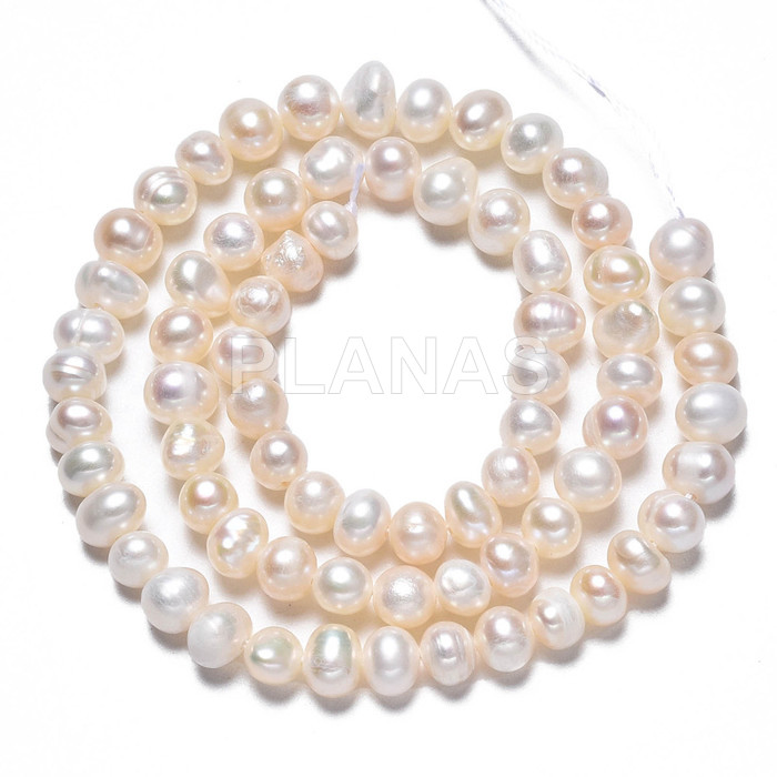 Strip of 8mm cultured pearls.