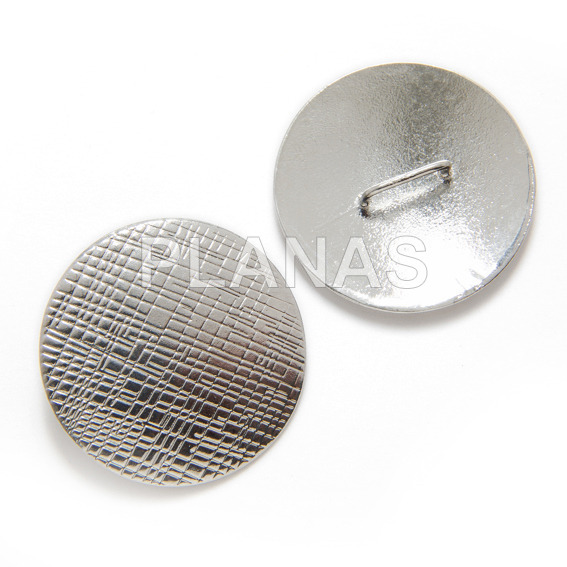 Cierre en Acero Inoxidable de botón.