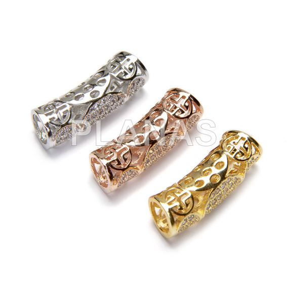 Brass and zirconia interpiece.
