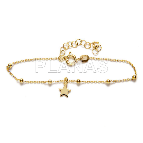 Pulsera en Plata de ley y baño oro. ESTRELLA.
