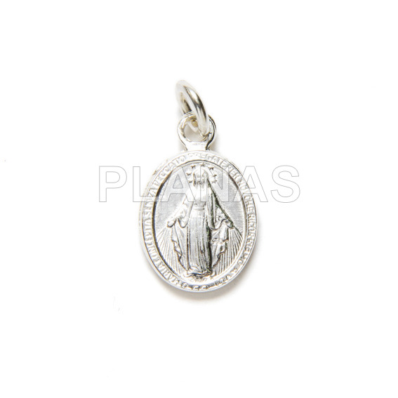 Mini pendant in sterling silver.