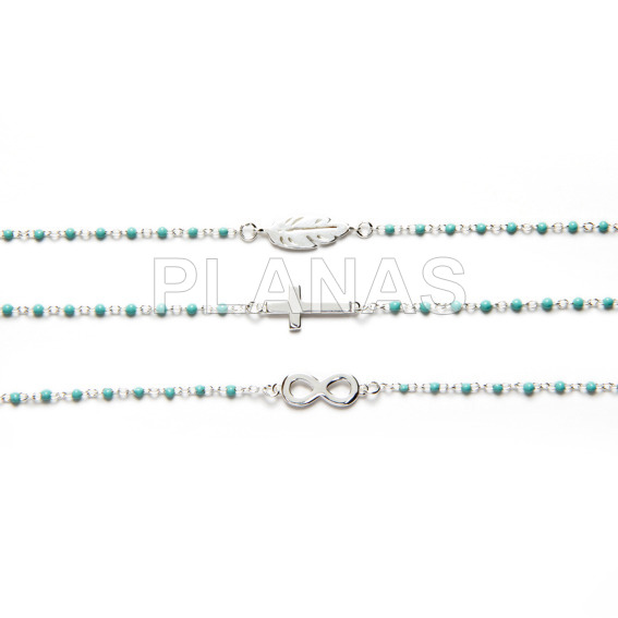 Sterling silver bracelet and 2mm turquoise enameled beads.