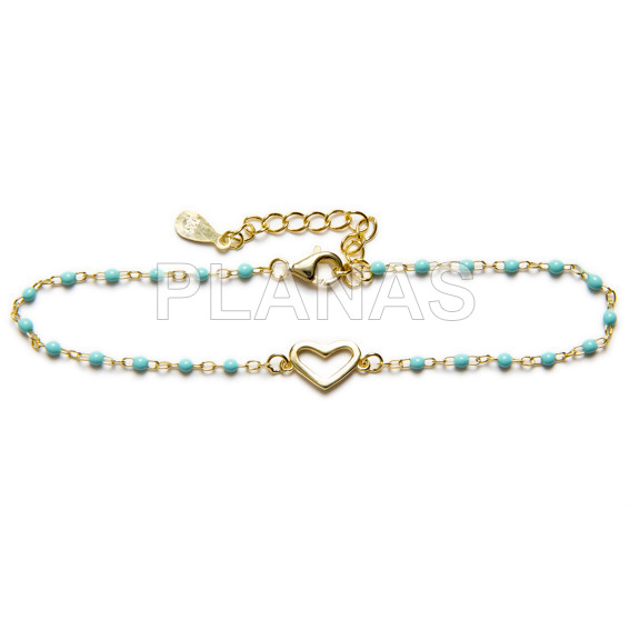 Sterling silver bracelet and 2mm turquoise enamel beads.