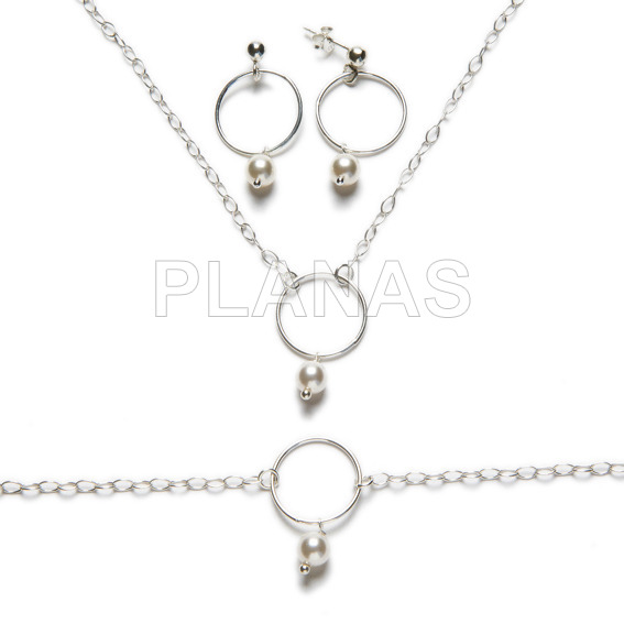 Set in sterling silver of 3 pieces and swarovski pearl.