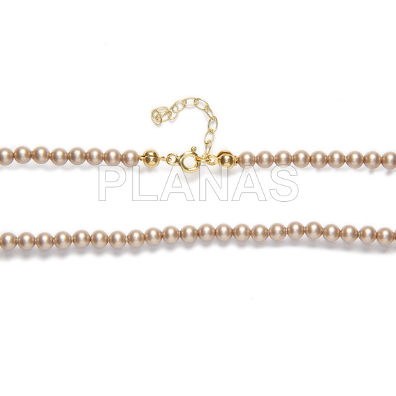 Pulsera en Plata de Ley y Baño Oro con perlas de gran calidad de 4mm.(Componente Cristal Austríaco de alta calidad).Color Power Almond.