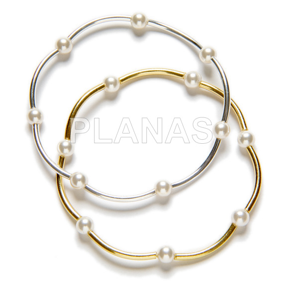 Elastic bracelet with 5mm swarovski pearls and sterling silver.