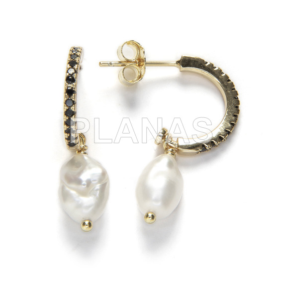 Earrings in rhodium-plated sterling silver with cultivated pearl and zircons.