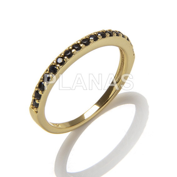 Gold-plated sterling silver ring with 1 micron and black zircons.