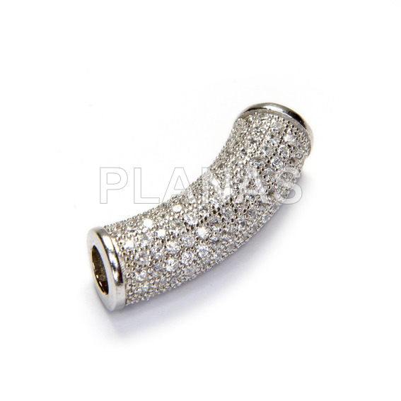 Spacer in rhodium sterling silver and zircons. 25x7mm.
